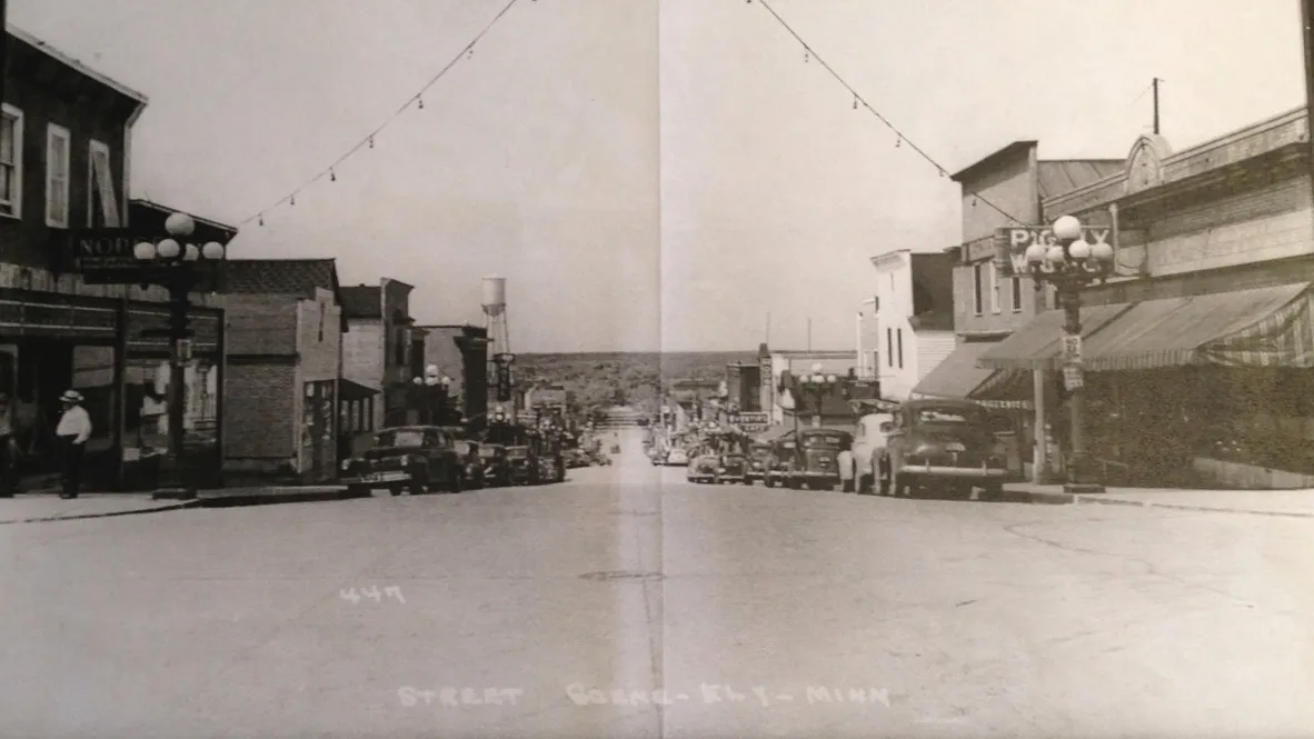 Postcard view down Sheridan Street