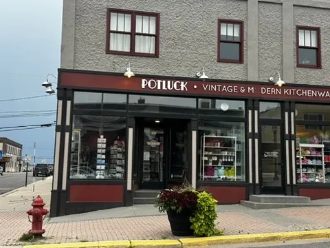 Potluck Vintage and Modern Kitchenware storefront on the corner