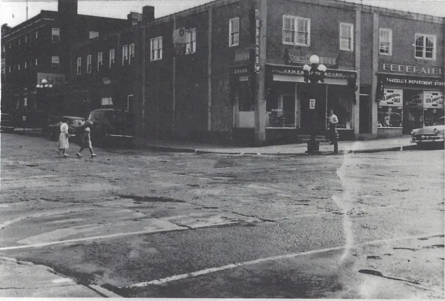 The corner with James Drug Store and Tauzell’s Department Store, people crossing the street