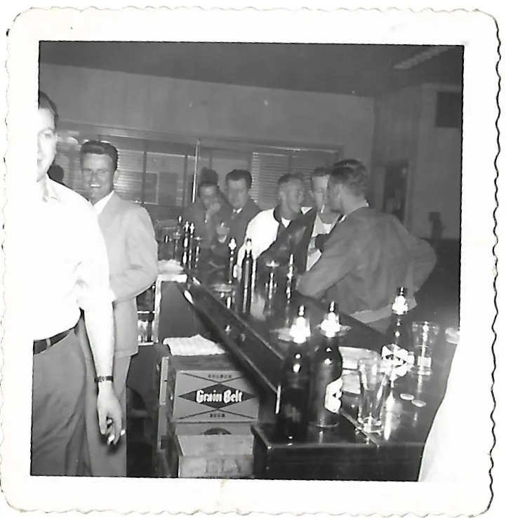 Regulars lined up along the bar