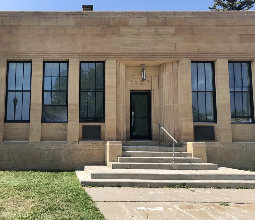 The restored AFU building with its buff limestone walls and tall windows