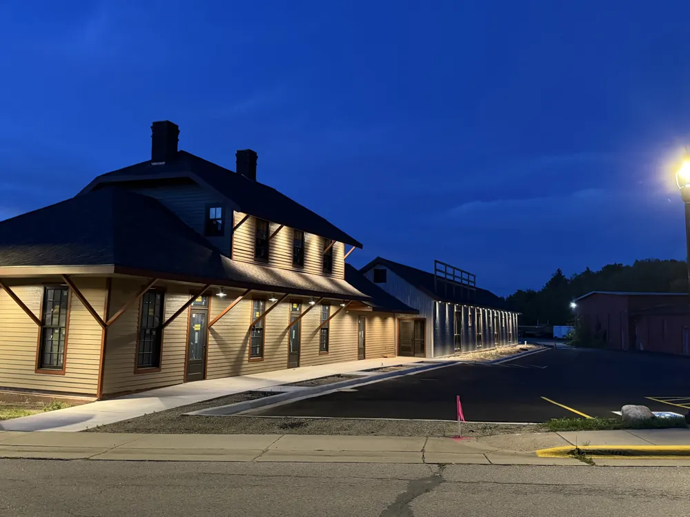 The restored depot lit up at dusk